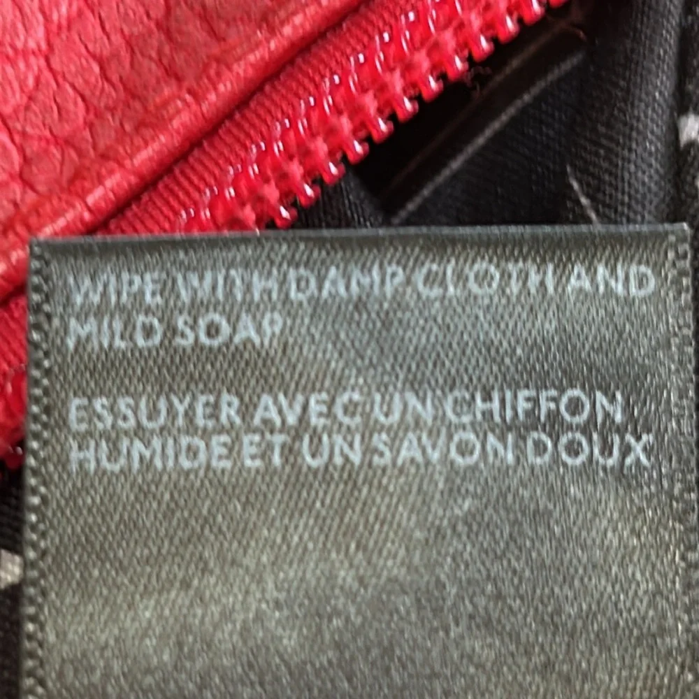 Free People red faux pebble leather travel zip bag.  Red. Approximately 11”X14”.